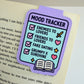 Mood Tracker magnetic bookmark clipped to an open book page