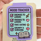Mood Tracker magnetic bookmark displayed on TinkerLass packaging