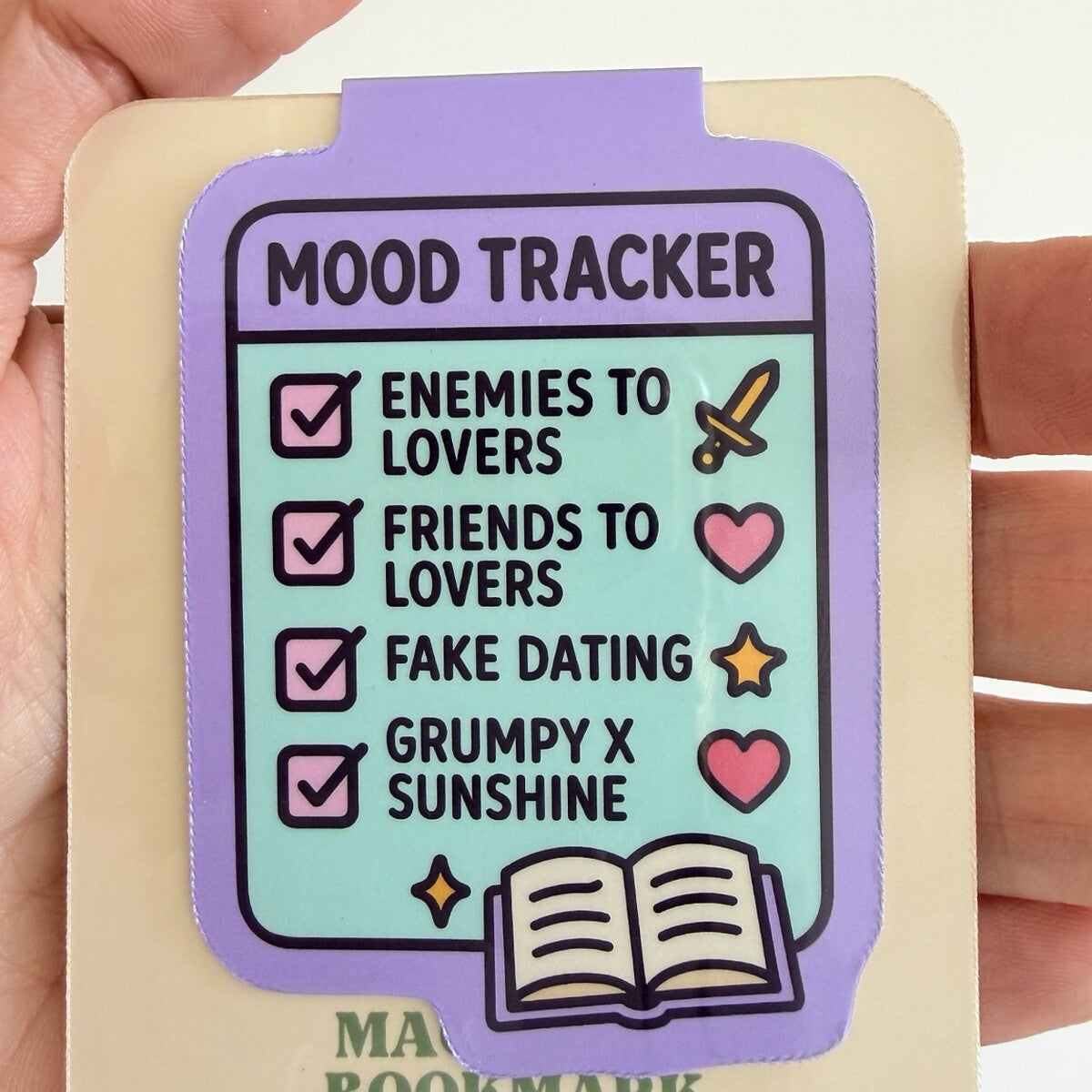 Mood Tracker magnetic bookmark displayed on TinkerLass packaging